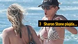 58'lik Sharon Stone bikiniyle plaj keyfinde