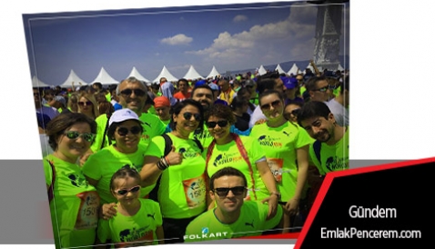 Folkart Yapı çalışanları koşamayan omurilik felçlileri için koştu